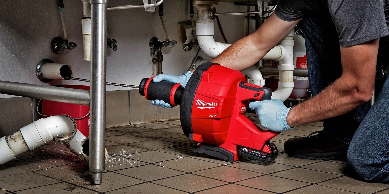 Milwaukee drain snake clearing clogged drain — Humble Roots Plumbing