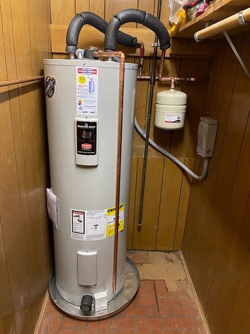 Electric water heater professionally installed — Humble Roots Plumbing